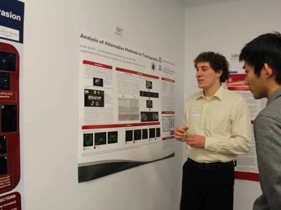Student Presenter with Visitor