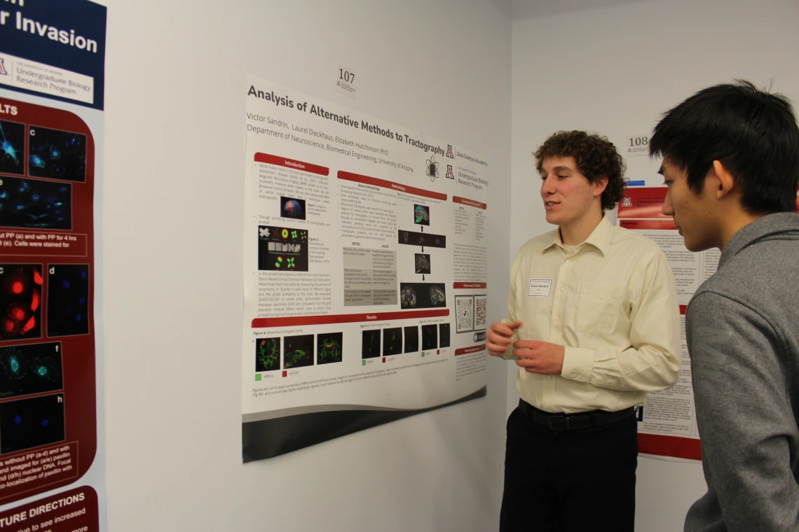 Student Presenter with Visitor