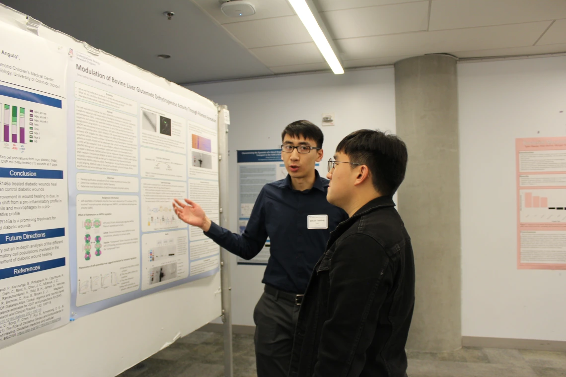 Student Presenter with Visitor
